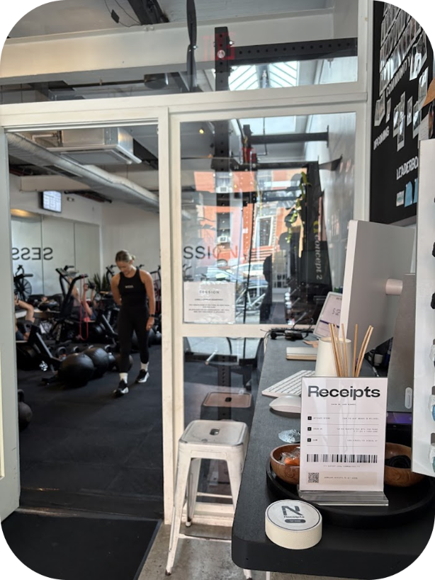 A Receipts puck at a gym front desk