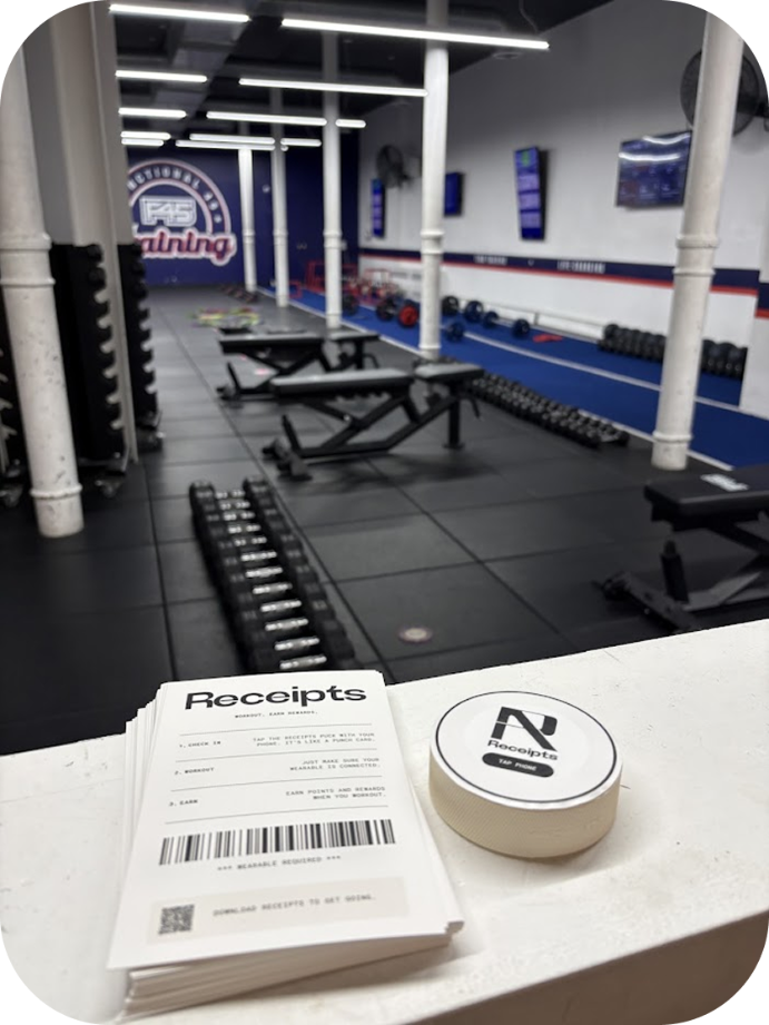 A Receipts puck on a gym floor